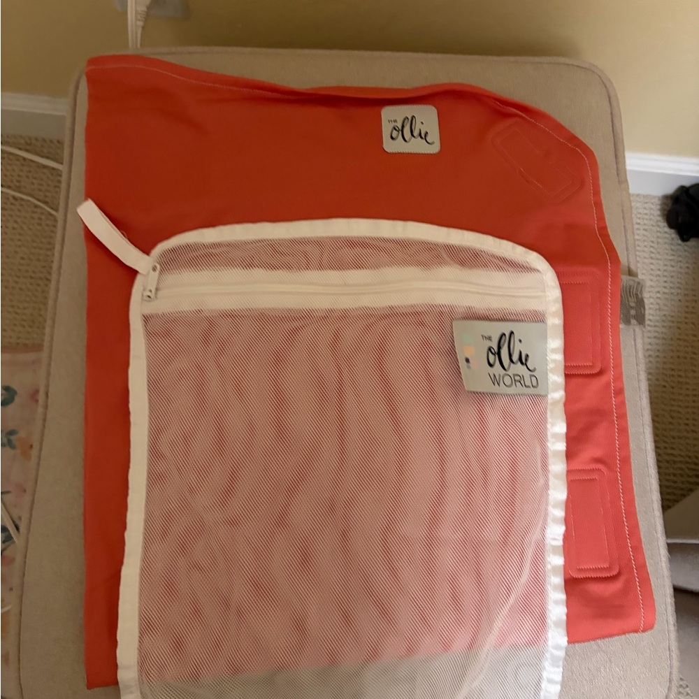 The Ollie World Swaddle Coral